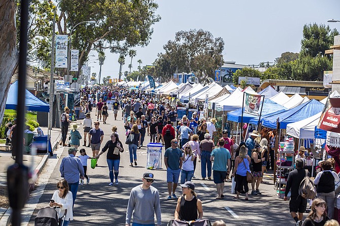 Free family fun, food, beer, arts and crafts, entertainment, on a traditional So-Cal beach town Main Street.