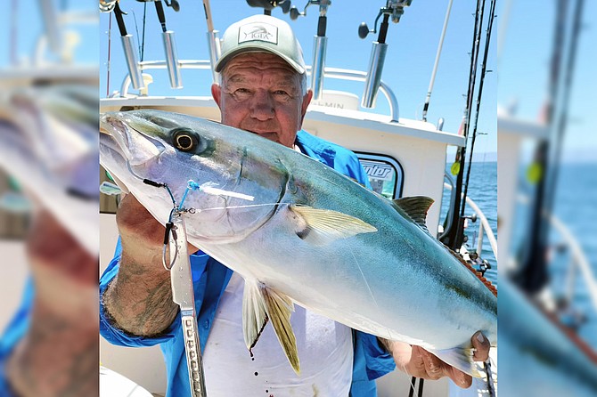 Captain Juan Cook with some decent table fare caught with tableware.