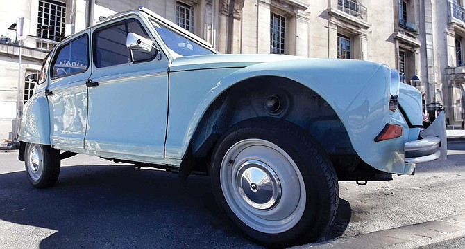 Once in Paris, I called Giovanni, and in about an hour, there he was — driving one of those old four-door Citroens with the cloth roof.