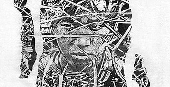 I opened the door of my box and stepped outside. Lying close to the ground, I crawled for a short distance past the meeting rooms of the camp commander.