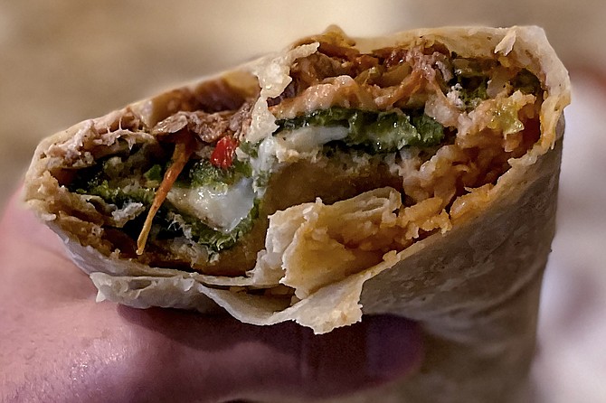 Halfway through a chili relleno burrito, add carnitas and jalapeño poppers
