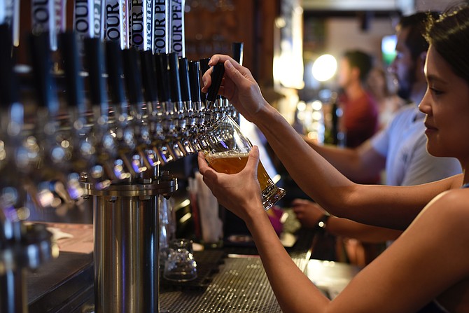 Pouring beer at brewery