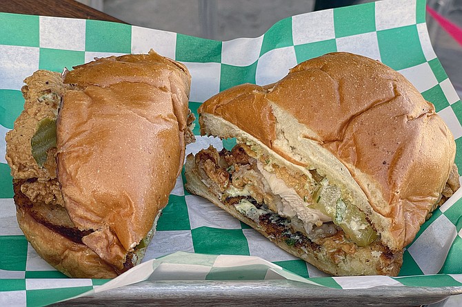 A double-battered fried chicken sandwich served on buttered and toasted brioche