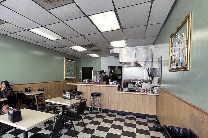 A barber shop converted to a burger counter