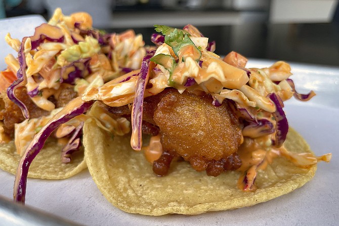 Baja style fish tacos made with fresh-made tortillas and beer-battered, locally caught rockfish
