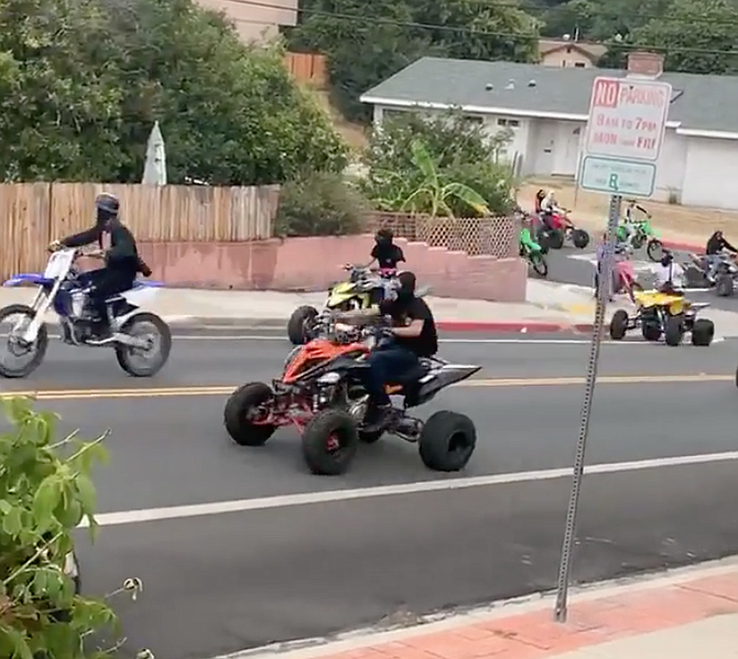 Large groups roll motocross bikes, 4-wheelers, street bikes, Honda Groms, electric and gas-powered scooters, motorized bicycles, ATVs, and old-school 3-wheelers.