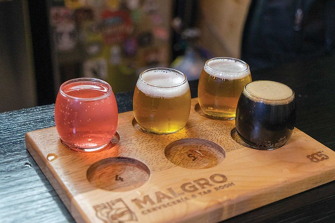 Malgro had a watermelon seltzer I didn’t care for and five beers on tap: Grecia (blonde ale), Honey (honey blonde), Bangkok (Belgian blonde), Kiss the Sky (hazy IPA), and 7 am (coffee stout).