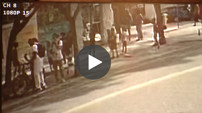 "I was still holding the bike and saw the fist heading toward my face."