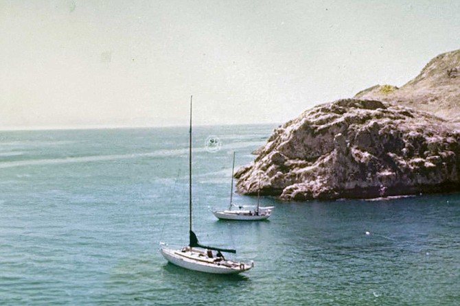 Cholita (sloop) with another sailboat anchored in Islas Todos Santos cove.