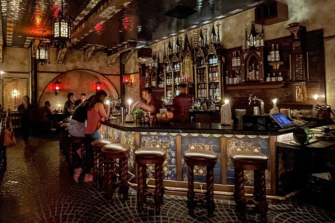 Stained glass and church pews lend to the standout design of Quixote