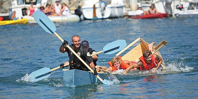 Local celebrities and politicos would race each other in boats they built. Most would capsize.