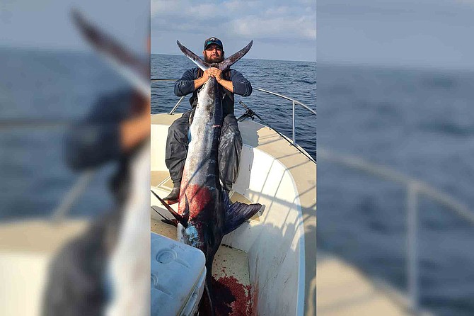 Joshua Witherwax with his 110-pound striped marlin caught within 8 miles of Oceanside Harbor. “My buddy hooked one and started getting spooled, I hooked one, his hook straightened almost immediately. Mine stuck. Watched at least one other fish jump and tail walk while fighting mine.”