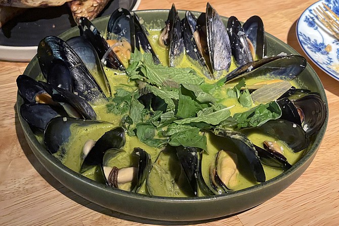 Prince Edward Island sourced mussels in a green curry broth