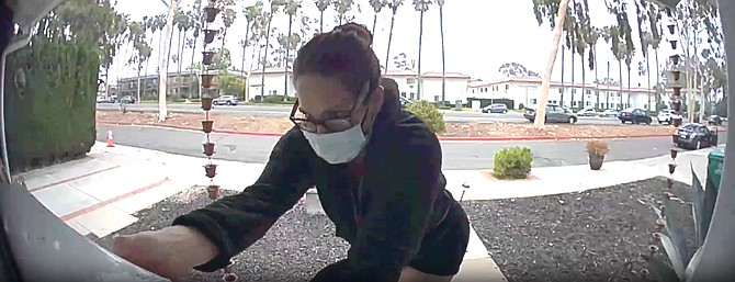 One Linda Vista neighbor captured a woman wearing a mask in late July, stealing her Amazon package and a mail-in ballot.