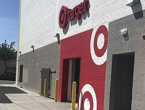 At the North Park Target an employee stood next to the thieves while they bagged the liquor bottles.
