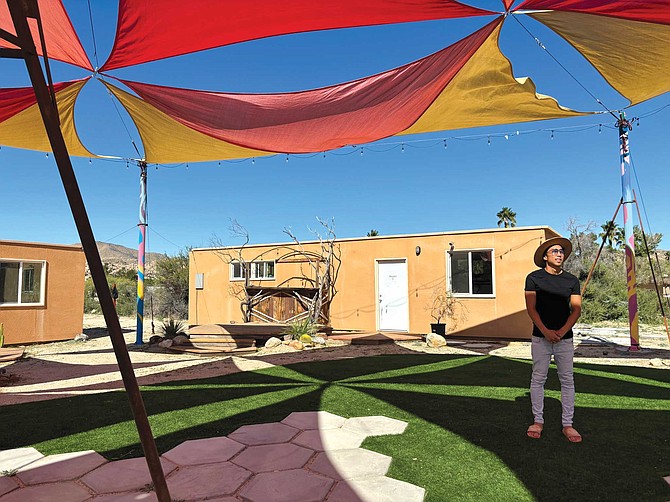 Kevin Cho stands in the new Red Zone festival grounds he created, “The Colony San Diego/Nomadic.”