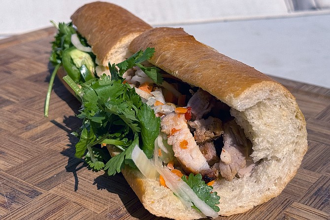 A crispy pork belly sandwich: bánh mì heo quay