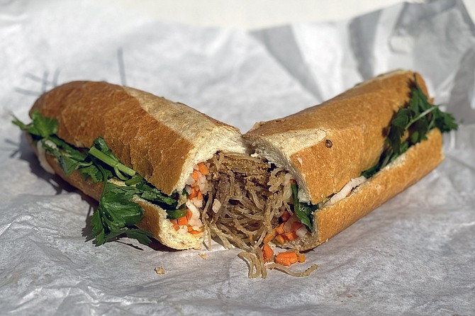 A vegetarian bánh mì, featuring tofu and glass noodles