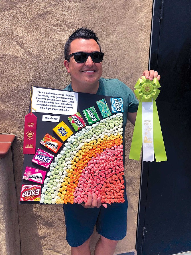“I chewed 500 pieces of gum and then stuck them on a board,” John Valencia recalls. “I submitted my collection to the Fair, and won Most Unique.”