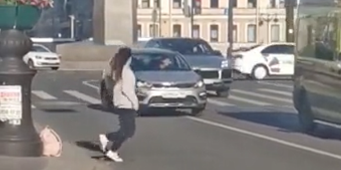 Woman who runs into cars on a busy street. (The video was deleted on TikTok but re-shared on Reddit.)