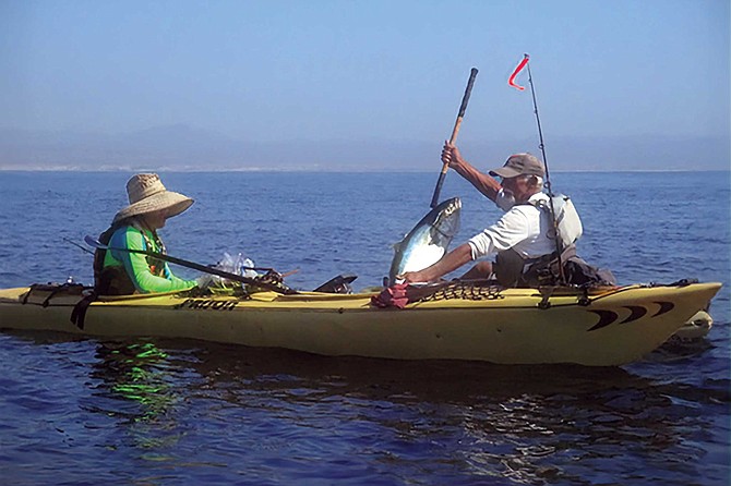 Avenida de la Playa brings a kayaker as near to big game fishing