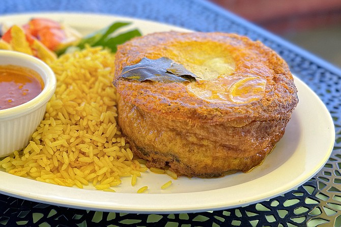 Bootie, a sort of  curried meat and egg custard pie sometimes considered the national dish of South Africa