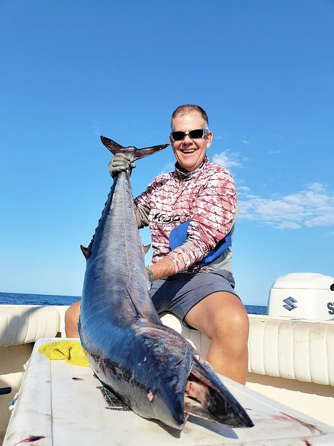 Western Outdoor News’ Pat Mcdonell with a big wahoo caught while fishing with Captain Juan Cook out of Lopez Mateos.