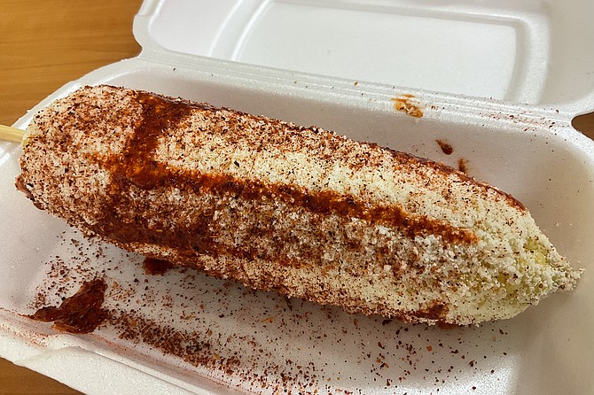 Elote is corn on the cob with mayo, cotija cheese, hot sauce and Tajin. Wicked healthy.