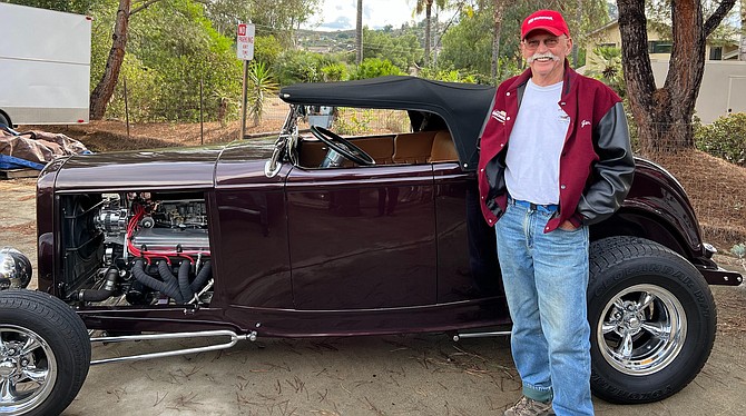 Club Secretary Jim Reid and his fender-free roadster.
