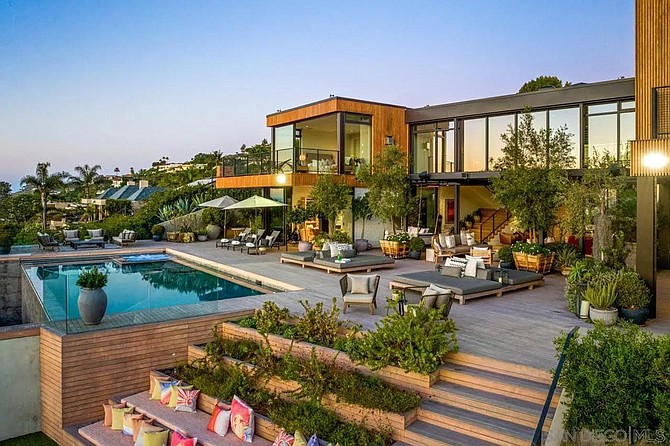 Warm wood, artful terraces, an infinity pool — and oh yes, ocean views galore.