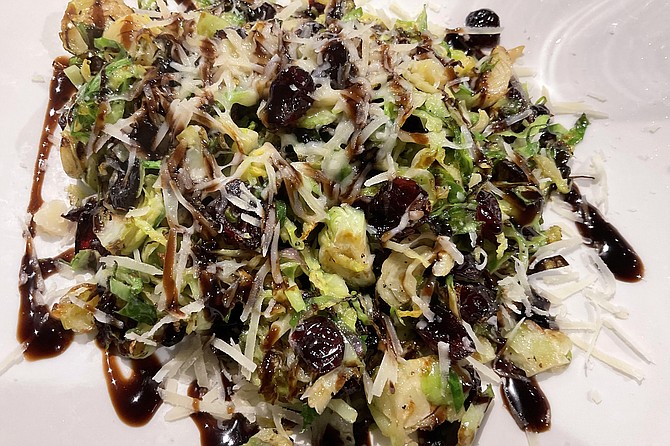 Brussels sprouts, Chocolat-style. Delish mix of cranberries, shallots, parmesan, $9.