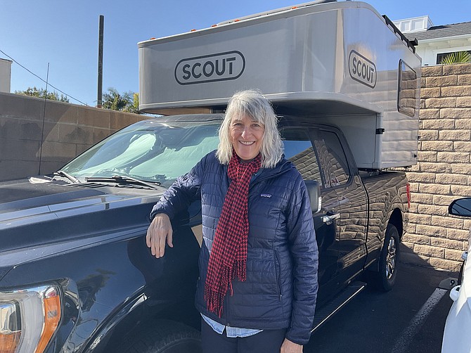 Independent: Mary Beth Parr with her F150 and Scout on the back.