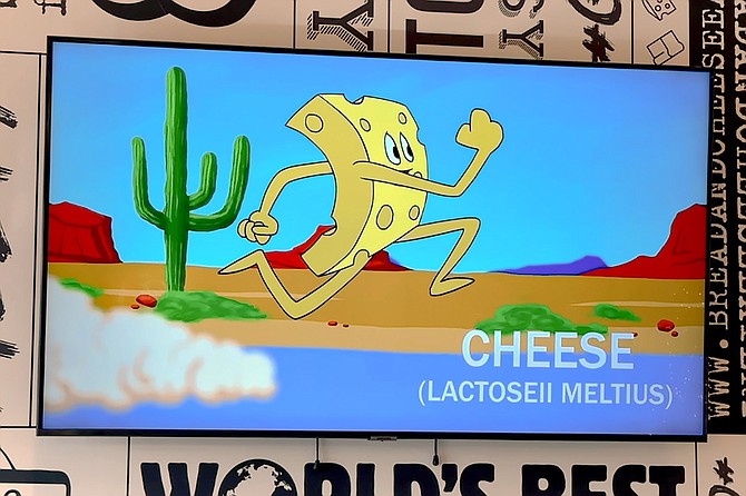 A frame from a "Road Runner" inspired grilled cheese cartoon