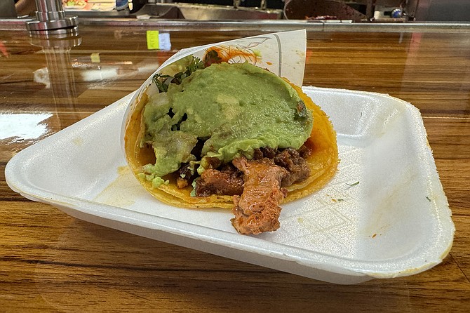 If you must take a photo of your adobada taco, do it quickly. This thing is best eaten immediately.