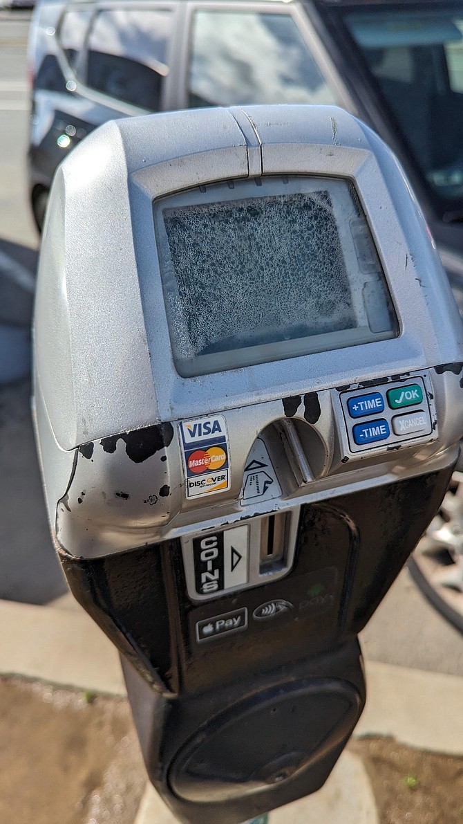 "I approached the meter maid and asked her what was up with the 30-40 parking meters; they were all cloudy."