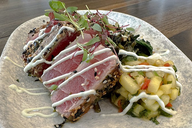 Search ahi tuna, crusted in the Japanese seaweed and spice blend, furikake