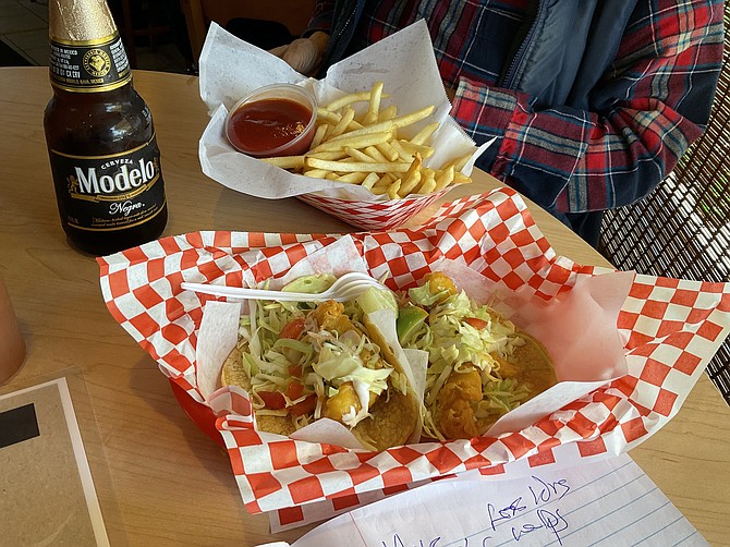 Larry’s lunch - two 99- cent tacos plus extras he couldn’t resist.