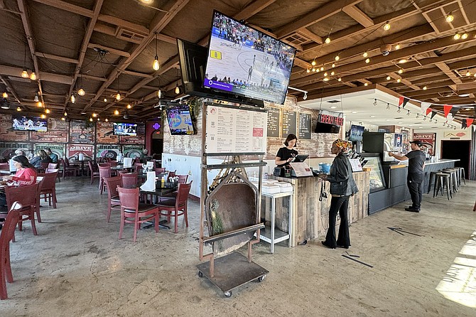 What used to be a large pizza and paste place is now a large BBQ spot