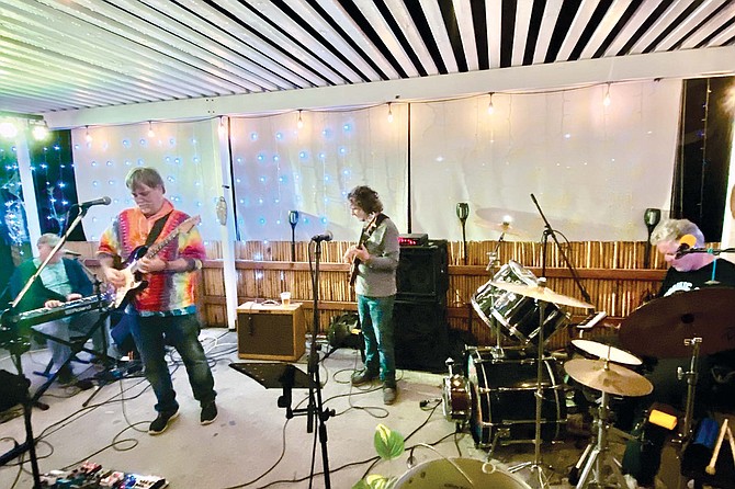 The local players of the Electric Waste Band make a wall of sound. They’ve been playing together for so long that they all know where they’re going and the exact notes to hit.
