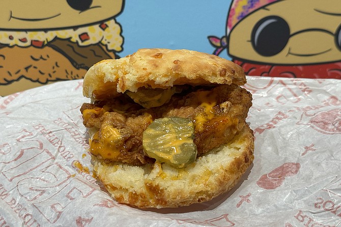 The "Righteous Chicken Sandwich," with house sauce and optional cheddar biscuit