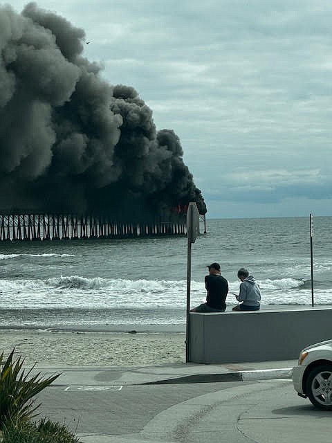 Oceanside fire officials say it appears to have started under the pier.