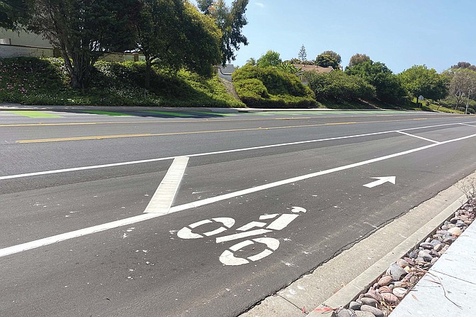 On Tamarack Avenue east of El Camino Real, the road was narrowed from two lanes in each direction to just one, with the remaining traffic lane significantly narrower than the bike lane and buffer lane.