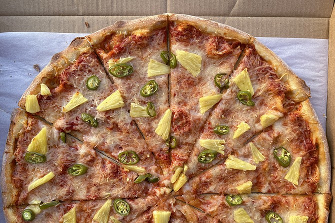 The "Hot Helix Hawaiian" pizza: Serrano peppers and pineapple, with the dairy-free cheese option.