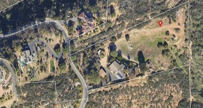 The three-acre property on Seaforever Drive is located in a rugged part of San Marcos.