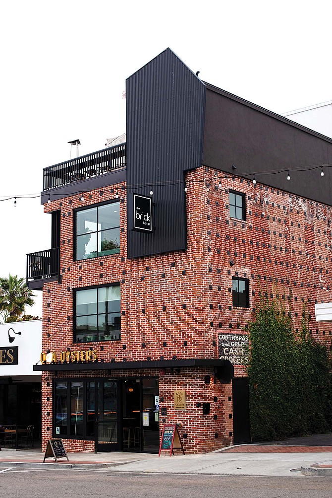 Aldrich’s Brick Hotel complex opened in June 2022 after a five-year renovation project. The structure was disassembled, brick by brick; retrofitted; and then reassembled with the original bricks.