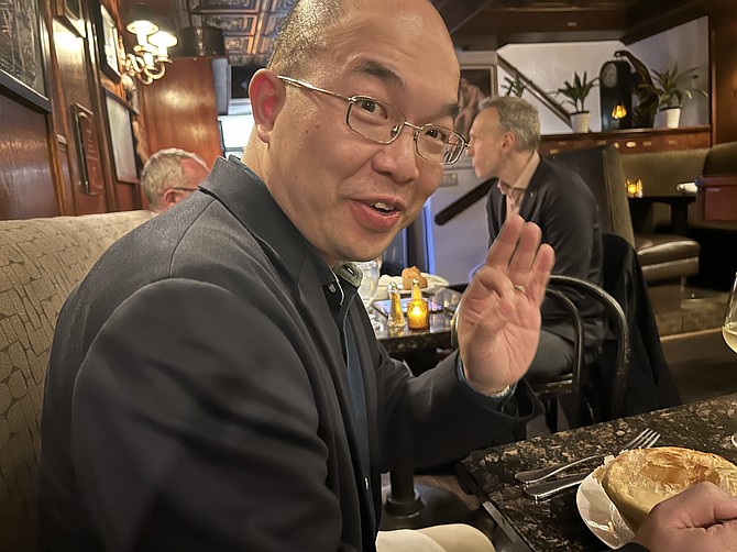 Singapore visitor Denis Tse approves of his mussel bisque en croute.