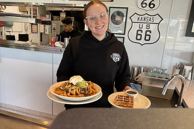 Rosalie brings my brekky of nachos, waffle