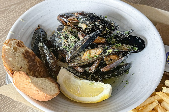 Beer steamed and over-seasoned moules frites