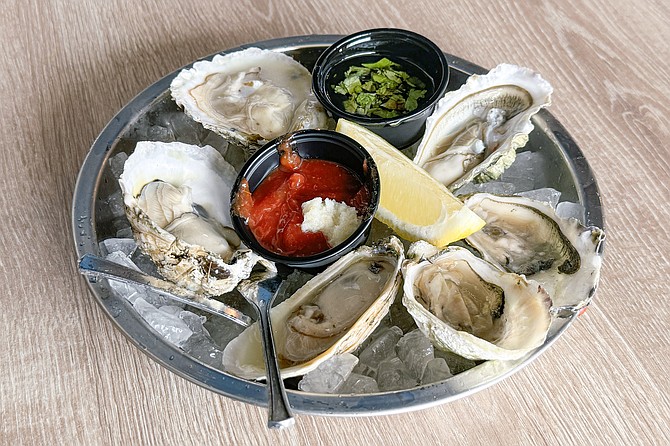 A mix of Blue Point and Hollywoods oysters
