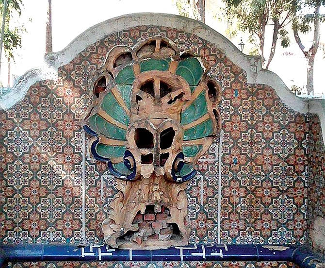 The vandalized faun before restoration.